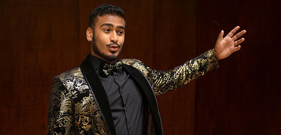 Student on stage singing