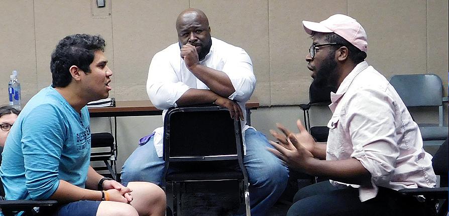 Cleo guiding students