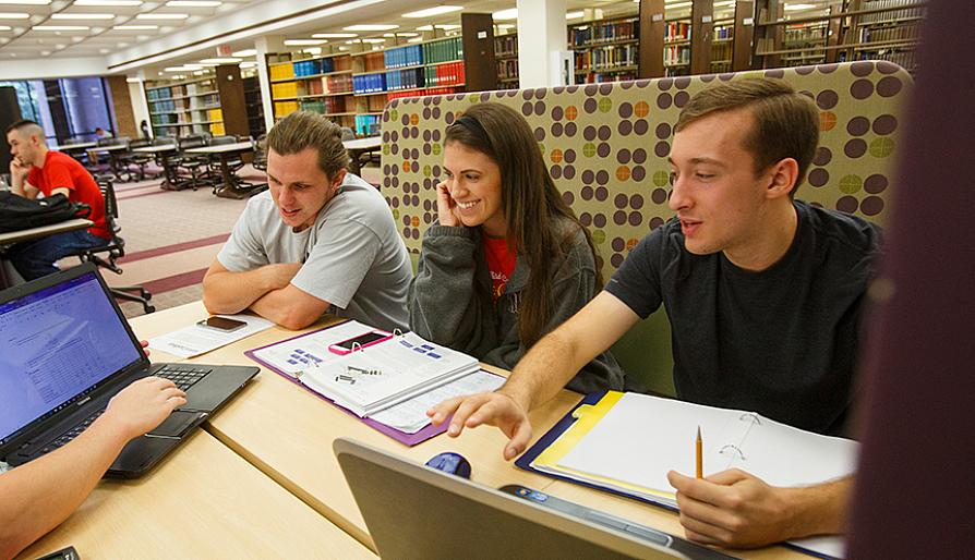 students in library