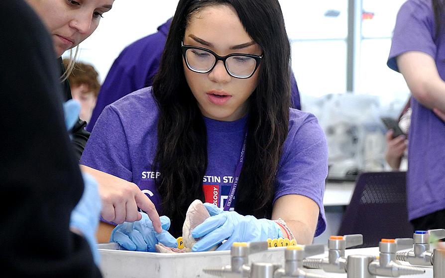 Student in the lab on a STEM field trip
