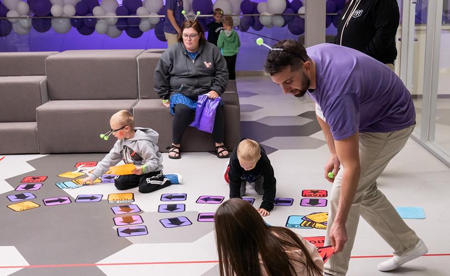 STEM Leaders working with children at an event